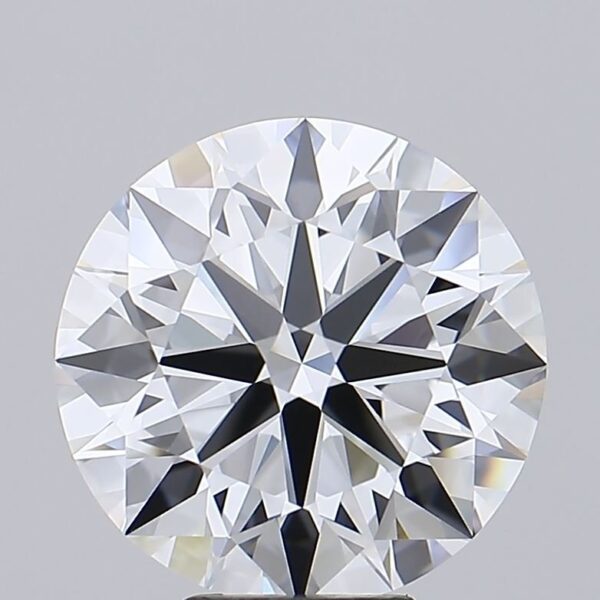 This 7.14 carat Round lab created diamond is certified by IGI as E color VVS1 clarity and Rare Carat Ideal cut. It can be purchased as a loose diamond or set in a ring.