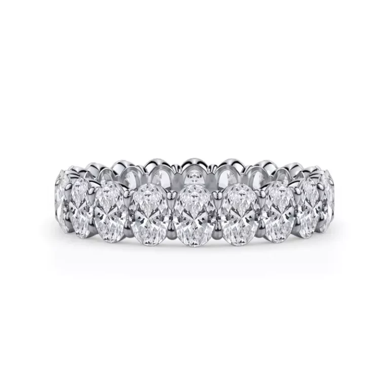 Elegance meets grandeur in this 3-carat oval lab diamond eternity ring. Mesmerizing ovals symbolize timeless love and sophistication. Details provided for size 6. Stone count and weight may vary by finger size.