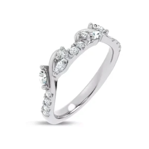 Round and marquise diamonds line halfway around the band, designed to pair with the matching engagement ring for a perfect fit.