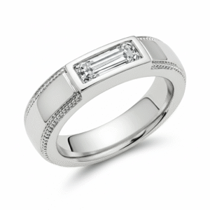 A bold statement in luxury, this Emerald-cut natural diamond shines from a polished White Gold setting.